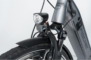 LED-фара для велосипеда FISCHER 70 LUX з функцією габаритного світла та автоматичним датчиком сутінків, динамо-генератор