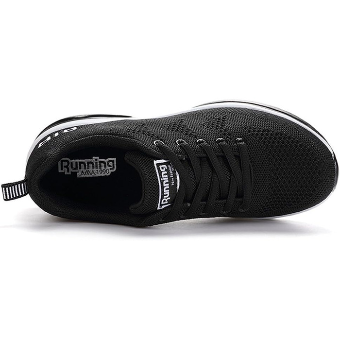 Кросівки для чоловіків та жінок. Легкі спортивні кросівки для бігу та ходьби. Розмір 44 EU. Білий та чорний колір.