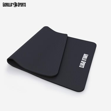 Йога мат GORILLA SPORTS® 190x100x1,5 см з ручним ременем, не містить фталатів, антиковзаюча, чорна. Підходить для фітнесу, гімнастики та тренувань