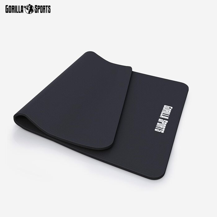 Йога мат GORILLA SPORTS® 190x100x1,5 см з ручним ременем, не містить фталатів, антиковзаюча, чорна. Підходить для фітнесу, гімнастики та тренувань
