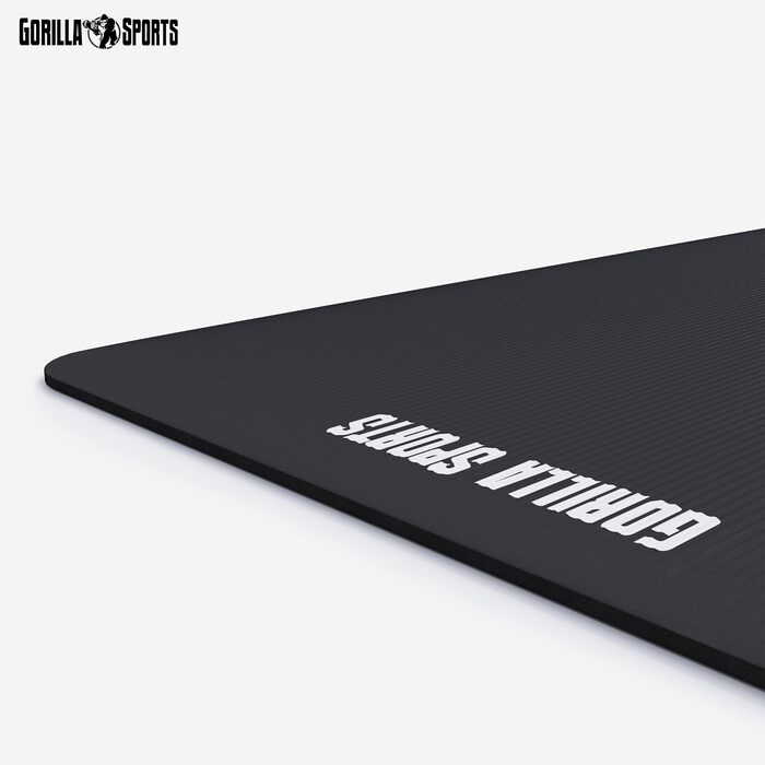 Йога мат GORILLA SPORTS® 190x100x1,5 см з ручним ременем, не містить фталатів, антиковзаюча, чорна. Підходить для фітнесу, гімнастики та тренувань
