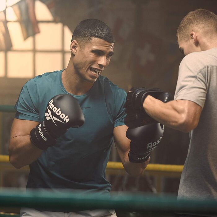 Боксерські рукавички Reebok 16 oz чорного кольору