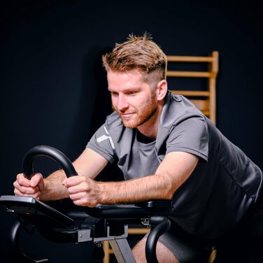 Велотренажер SportPlus Speedbike з тримачем для планшета, сумісний з додатком Speedracer, безступеневе регулювання навантаження, тримач для пляшки, LCD-дисплей тренувань
