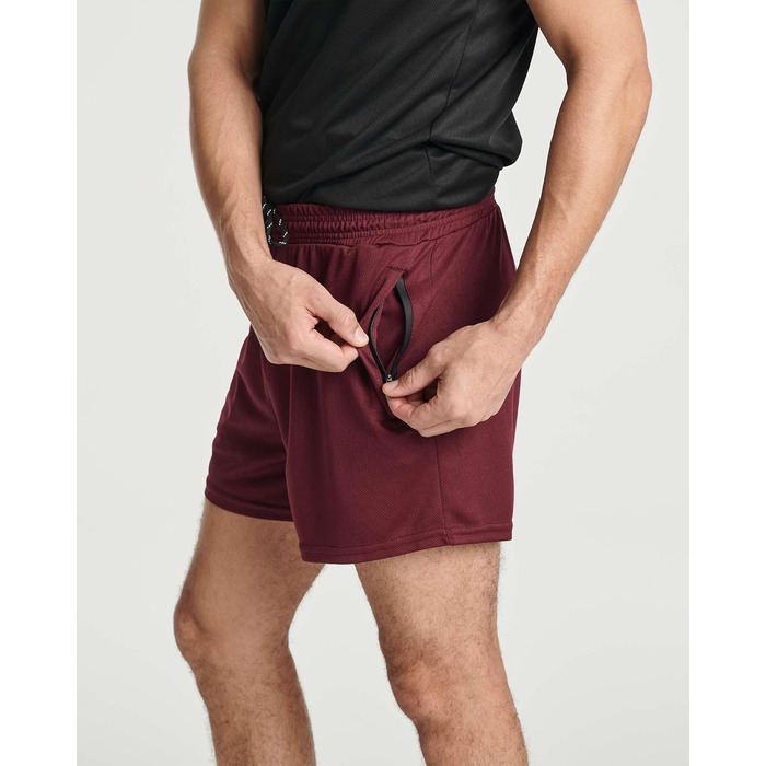 Чоловічі бігові шорти Real Essentials (4 шт.): сітчаста тканина, швидковисихаючі, з кишенями на блискавці та шнурком. Доступні розміри: L, XL