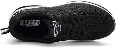 Кросівки для чоловіків та жінок. Легкі спортивні кросівки для бігу та ходьби. Розмір 44 EU. Білий та чорний колір.