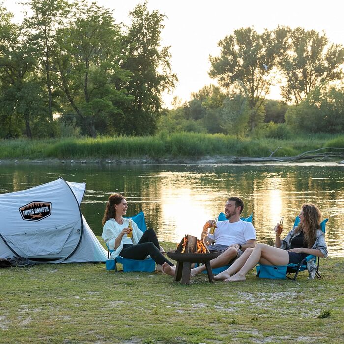 Крісло для кемпінгу Fuchs Camper Strandstuhl – складане, з високою спинкою та сітчастою тканиною. Зручне для відпочинку на пляжі та кемпінгу. Має тримач для напоїв та кишеню. Міцне (до 150 кг), чорне та синє (1 шт.)